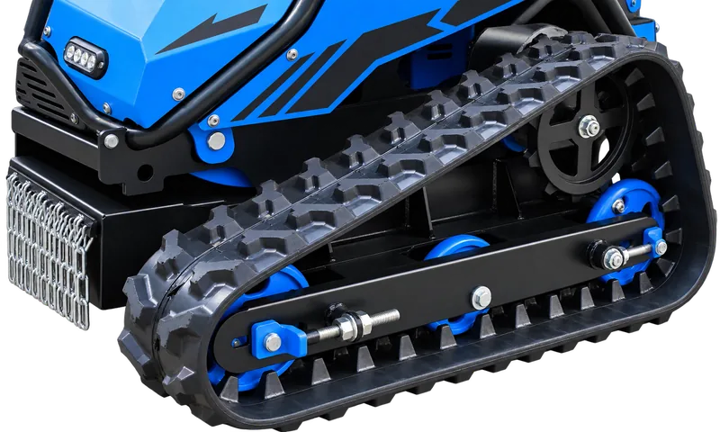 Detalle de las orugas de goma de 32 cm y ruedas de carga metálicas de la SAG600